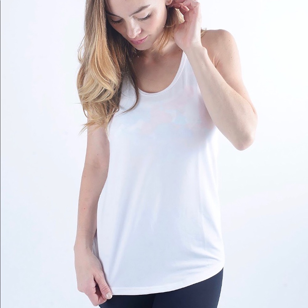 Never worn Women’s Zyia White Twist Tank size M.